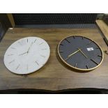 +VAT Black and gold coloured wall clock together with white and gold marble effect wall clock