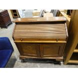 Oak roll top desk with 2 doors storage below
