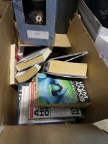 Box containing various books to include Jo Nesbo, Elton John biography, etc. with British Gas