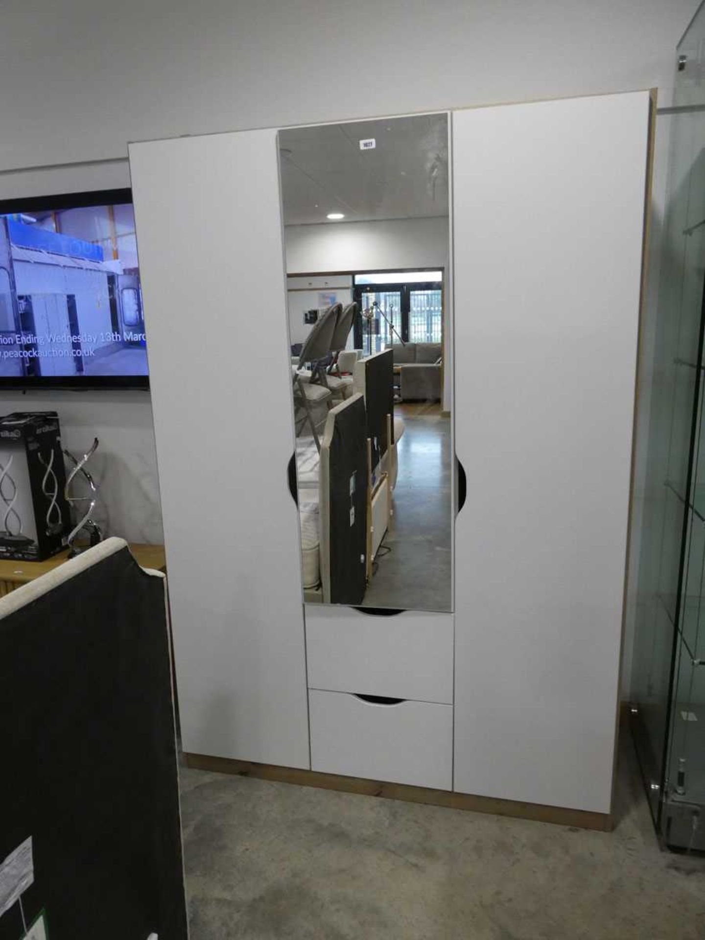 Modern 3 door wardrobe with mirrored front and 2 single drawers below