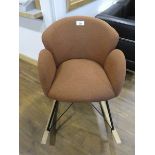 +VAT Burnt orange coloured upholstered rocking chair