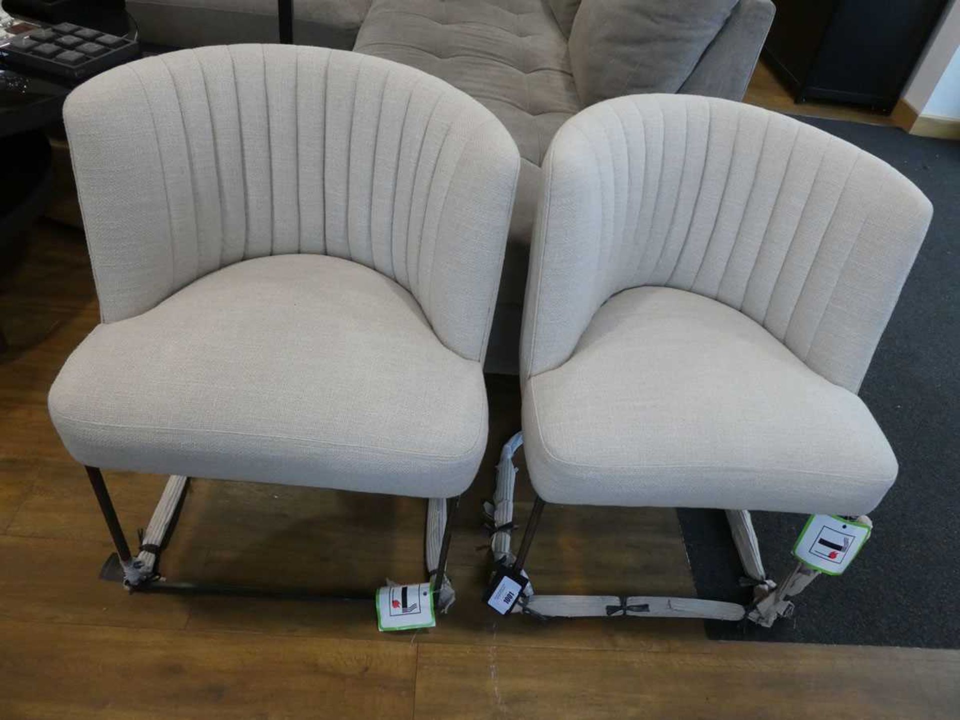 +VAT Pair of shell shaped natural upholstered slide frame dining chairs