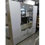 Mirrored front 4 door wardrobe with 4 single drawers below