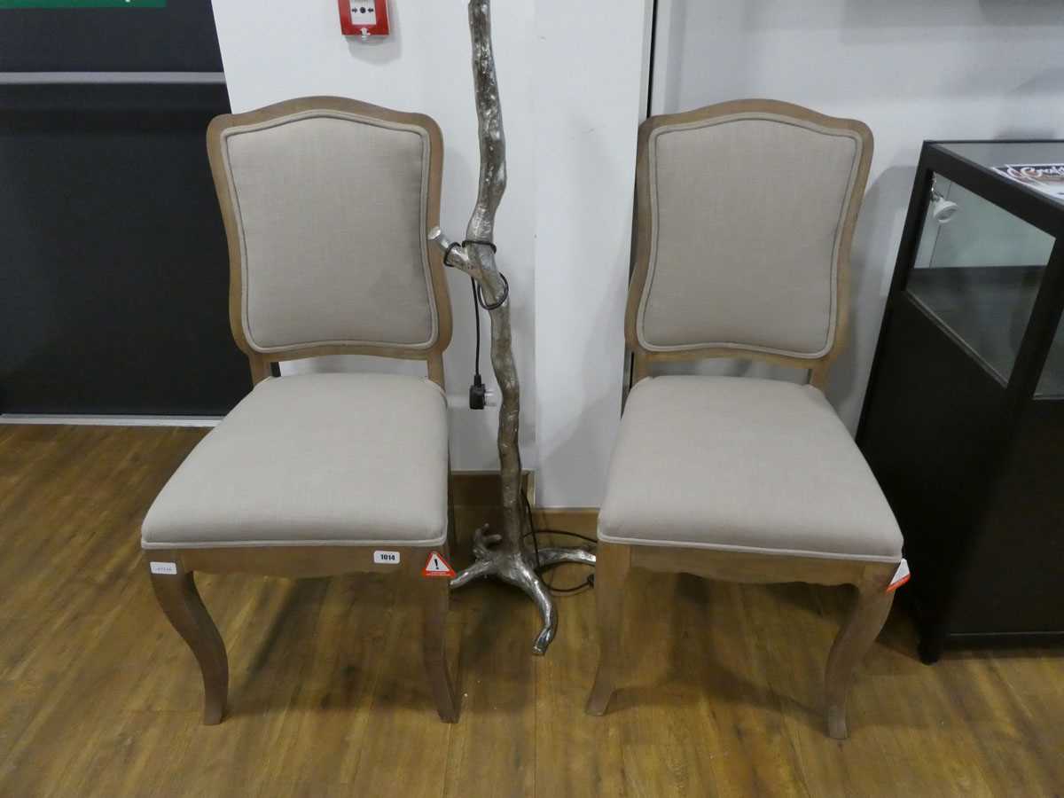 Modern pair of wooden framed natural upholstered dining chairs