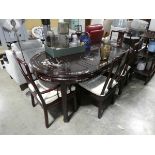 Mahogany coloured 6 seater dining table with decorative oriental decoration inserts together with