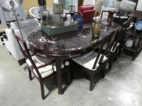 Mahogany coloured 6 seater dining table with decorative oriental decoration inserts together with
