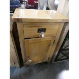 Light oak single door cupboard with drawer above Water damaged