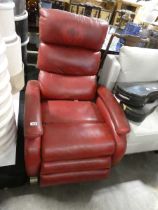 Red leather reclining armchair
