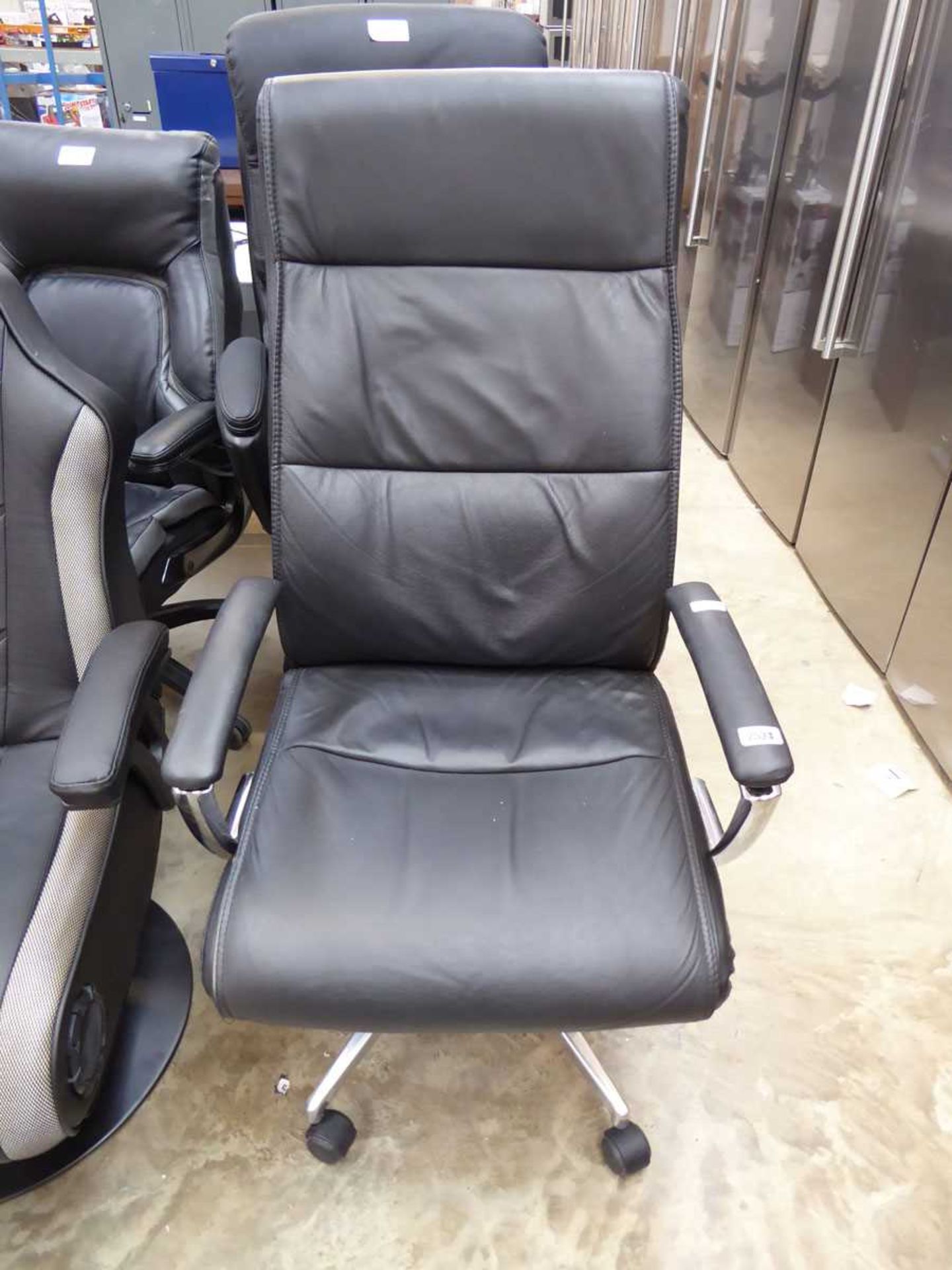 Black leatherette office armchair on chrome 5 star base