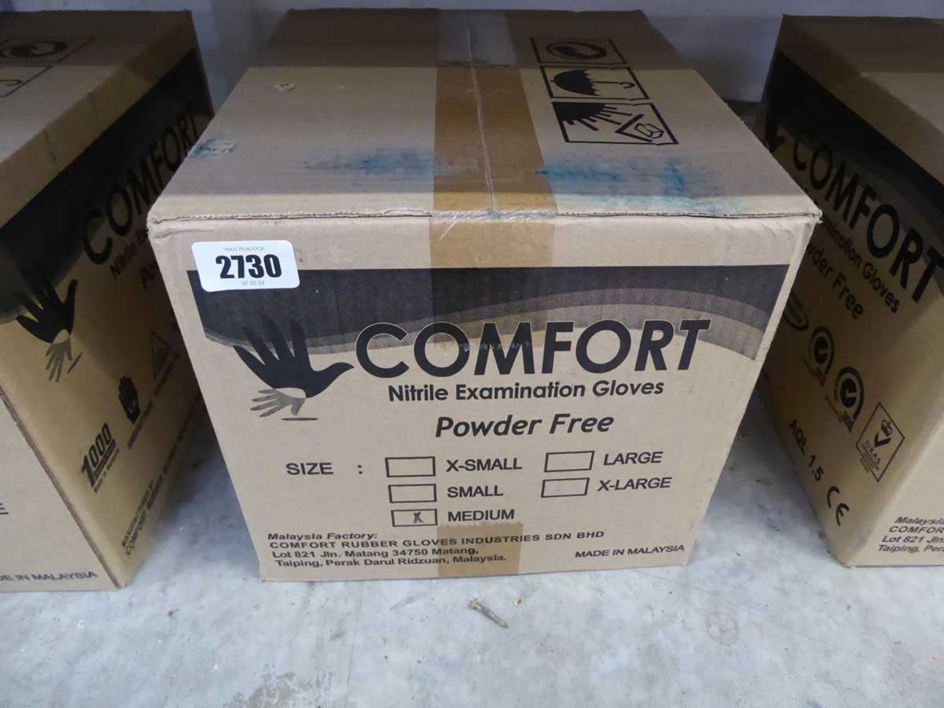 Box containing 10 packs of Comfort nitrile powder free examination gloves (size M) Date: 4/2023