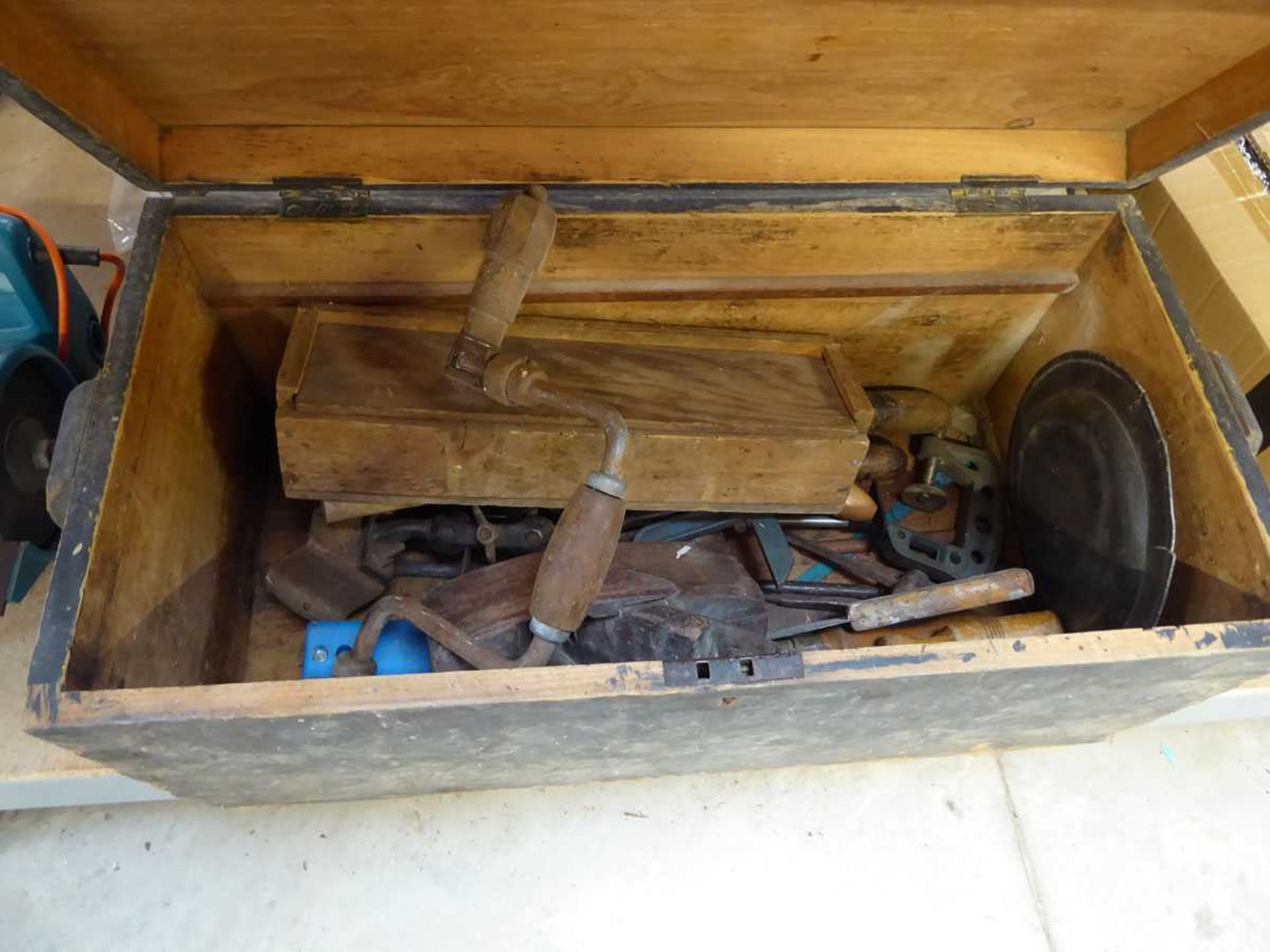 Wooden twin handled toolbox containing mainly woodworking hand tools incl. files, wood planes,