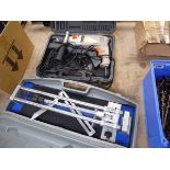 Cased Power base electric hammer drill, together with a cased manual tile cutter