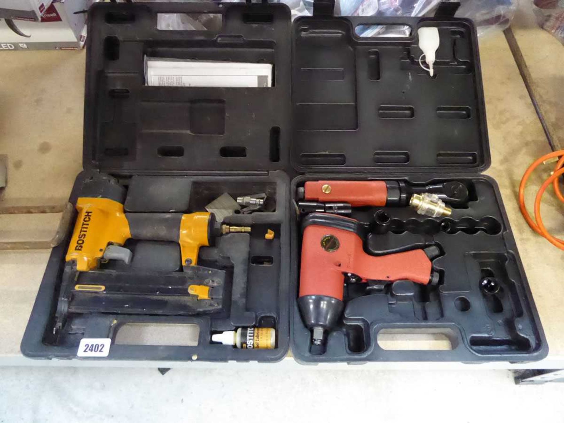 Cased Bostitch air operated nailer/ stapler with cased Neilsen air operated impact wrench