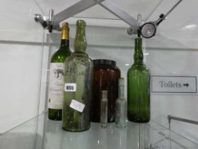 Collection of various glass bottles and jars