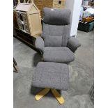 Modern grey upholstered swivel easy chair with matching footstool