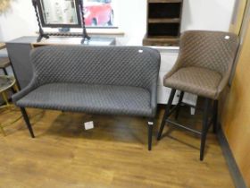 Charcoal coloured diamond stitch upholstered 2 seater sofa on black tapered supports with similar