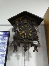 Heavily carved cuckoo clock