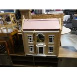 Childs dolls house and the contents of various accessories