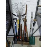 Quantity of outdoor garden hand tools to include shovels, brushes, rakes etc.