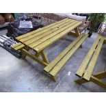 Wooden slatted picnic bench