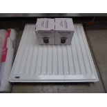 Small single panel radiator with 2 boxed LED ground lights