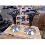 Pair of black and chrome height adjustable bar stools