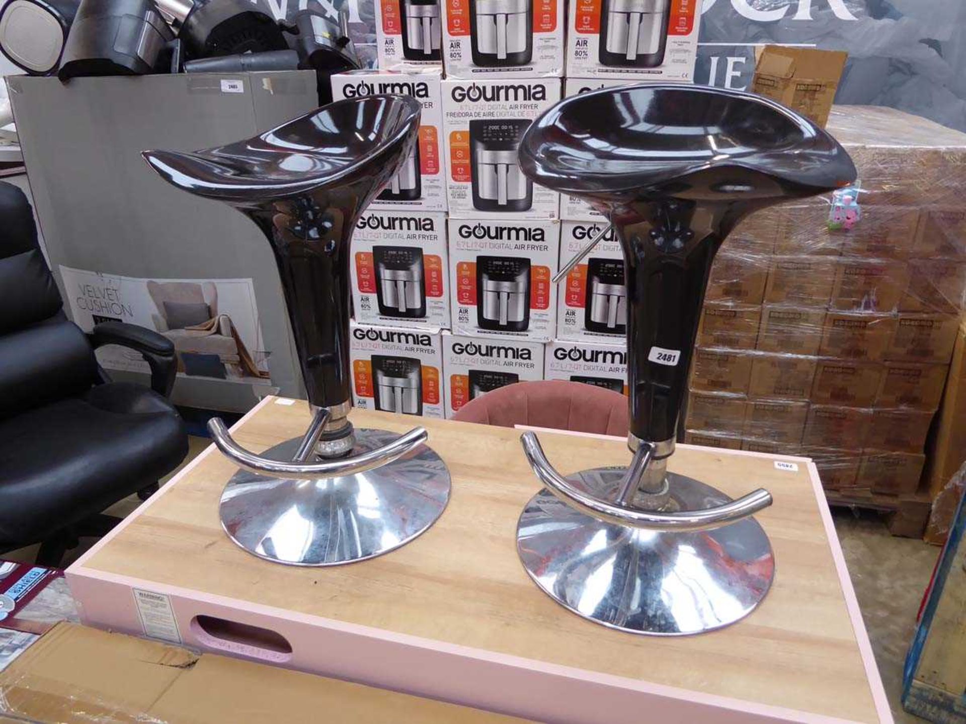 Pair of black and chrome height adjustable bar stools