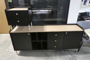Modern black sideboard with 3 central drawers and ribbed fronted doors with matching 2 drawer side