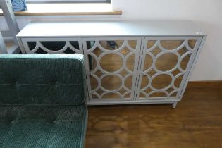 Modern grey mirror fronted sideboard with circular patterned door fronts