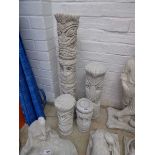 Set of 4 graduated concrete tribal columns