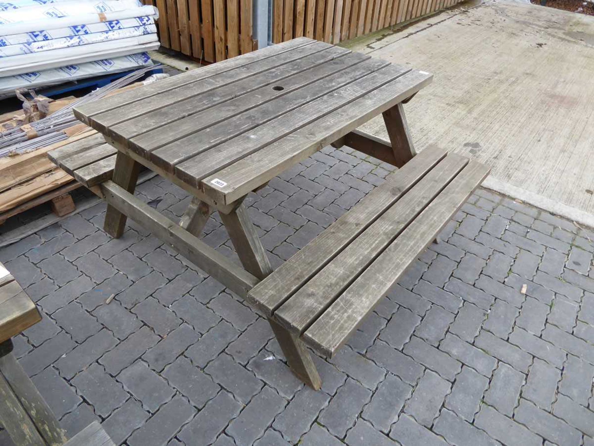 Wooden slatted picnic bench