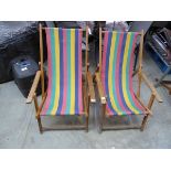 Pair of teak framed multicoloured upholstered sun loungers