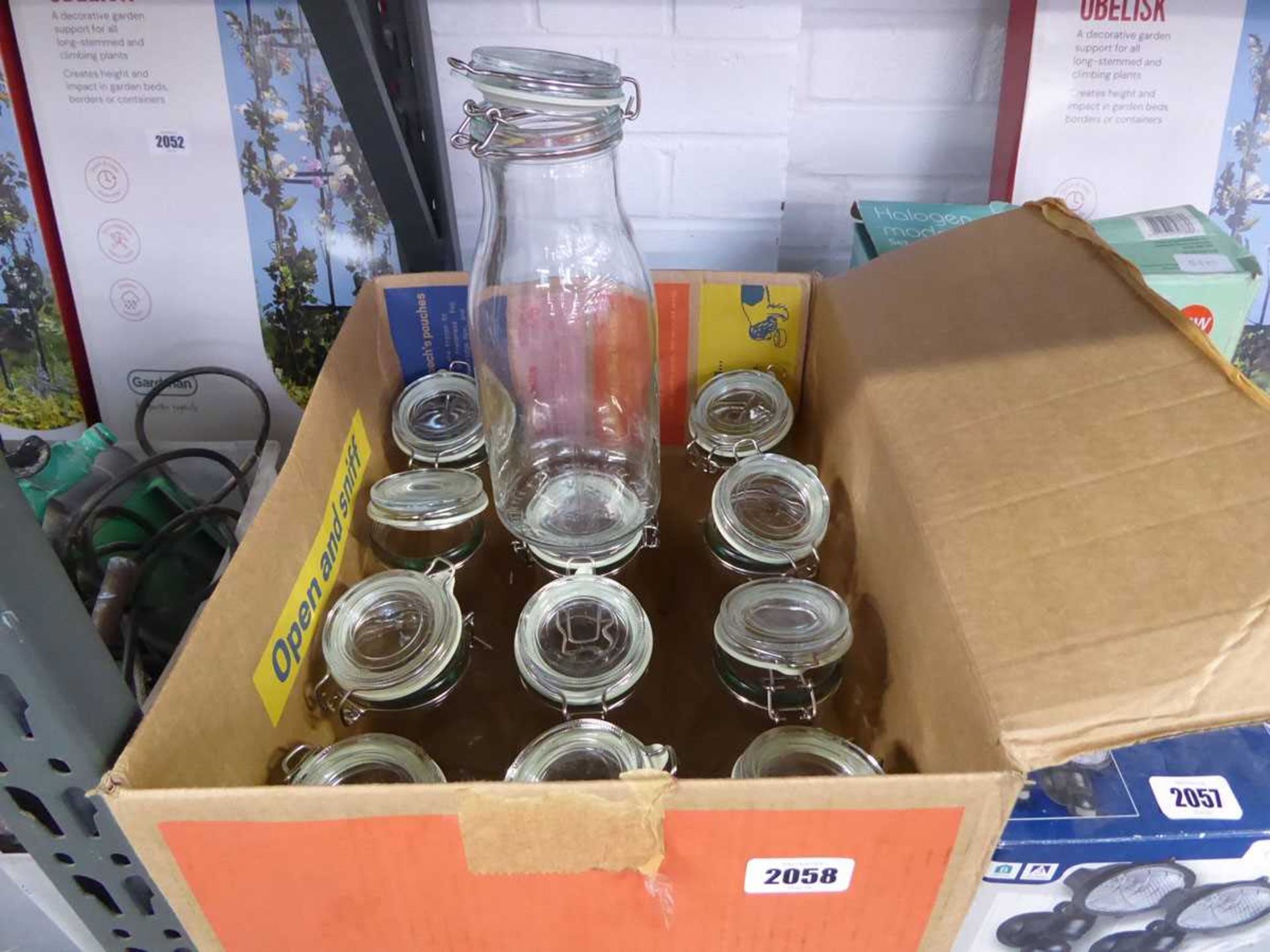 Box containing 12 glass jars