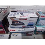 2 Tefal steam irons with 2 Russell Hobbs irons