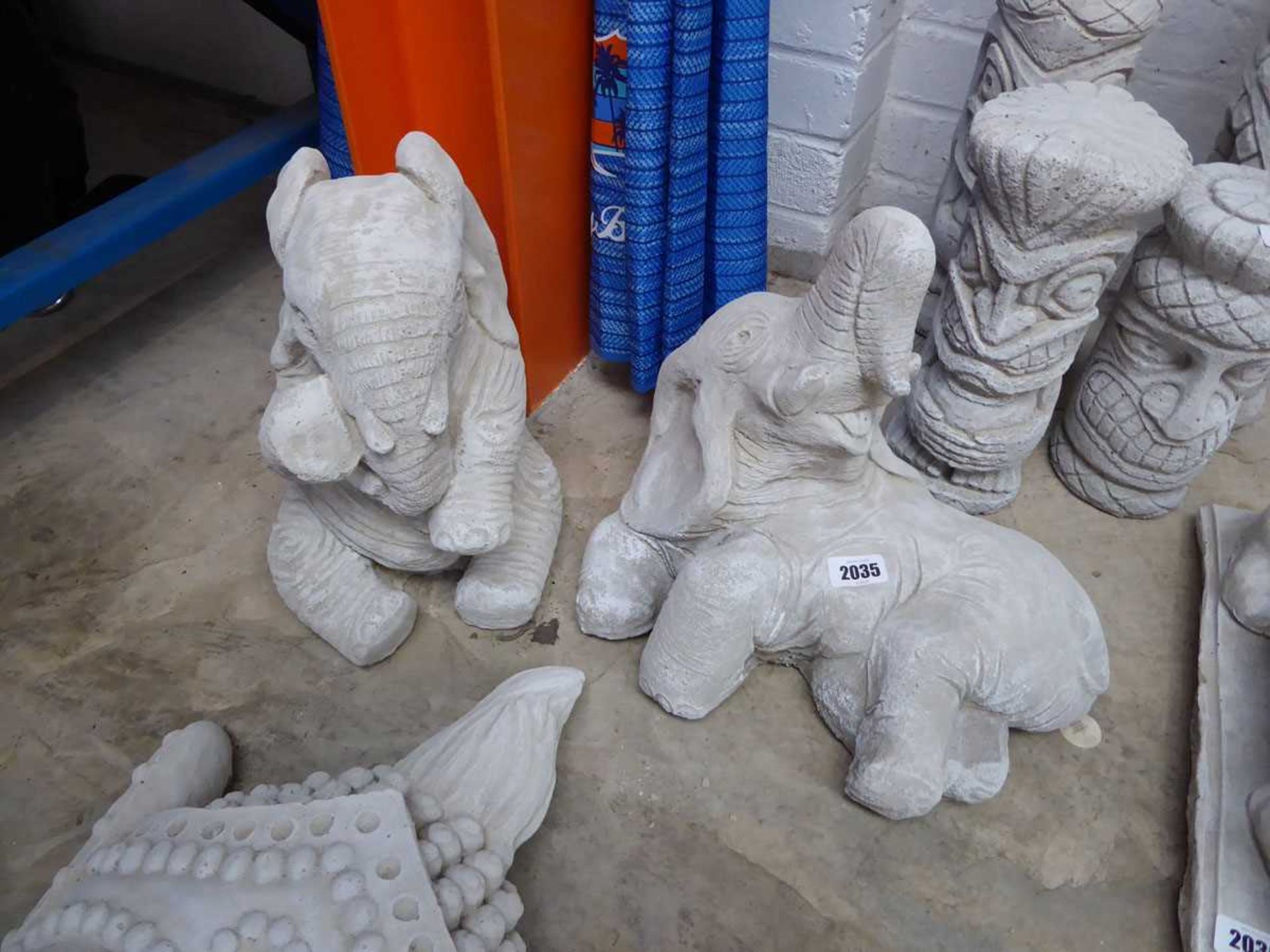 Pair of concrete elephants