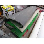 4 large rolls of green commercial flooring