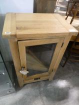 Modern light oak single door entertainment cabinet with single drawer to base Some water damage