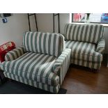 Modern pair of striped upholstered snug chairs