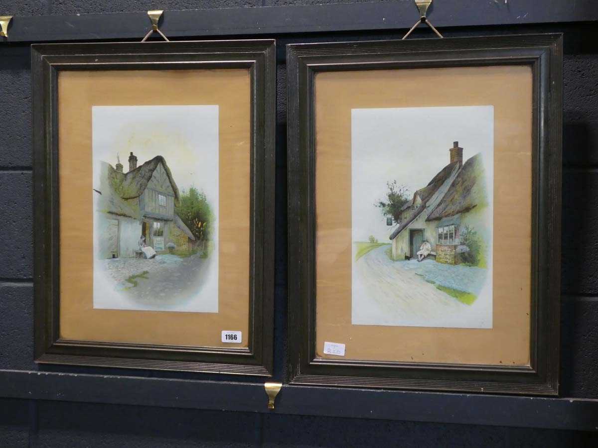 Matching pair of framed and glazed country cottage prints