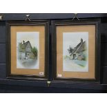 Matching pair of framed and glazed country cottage prints