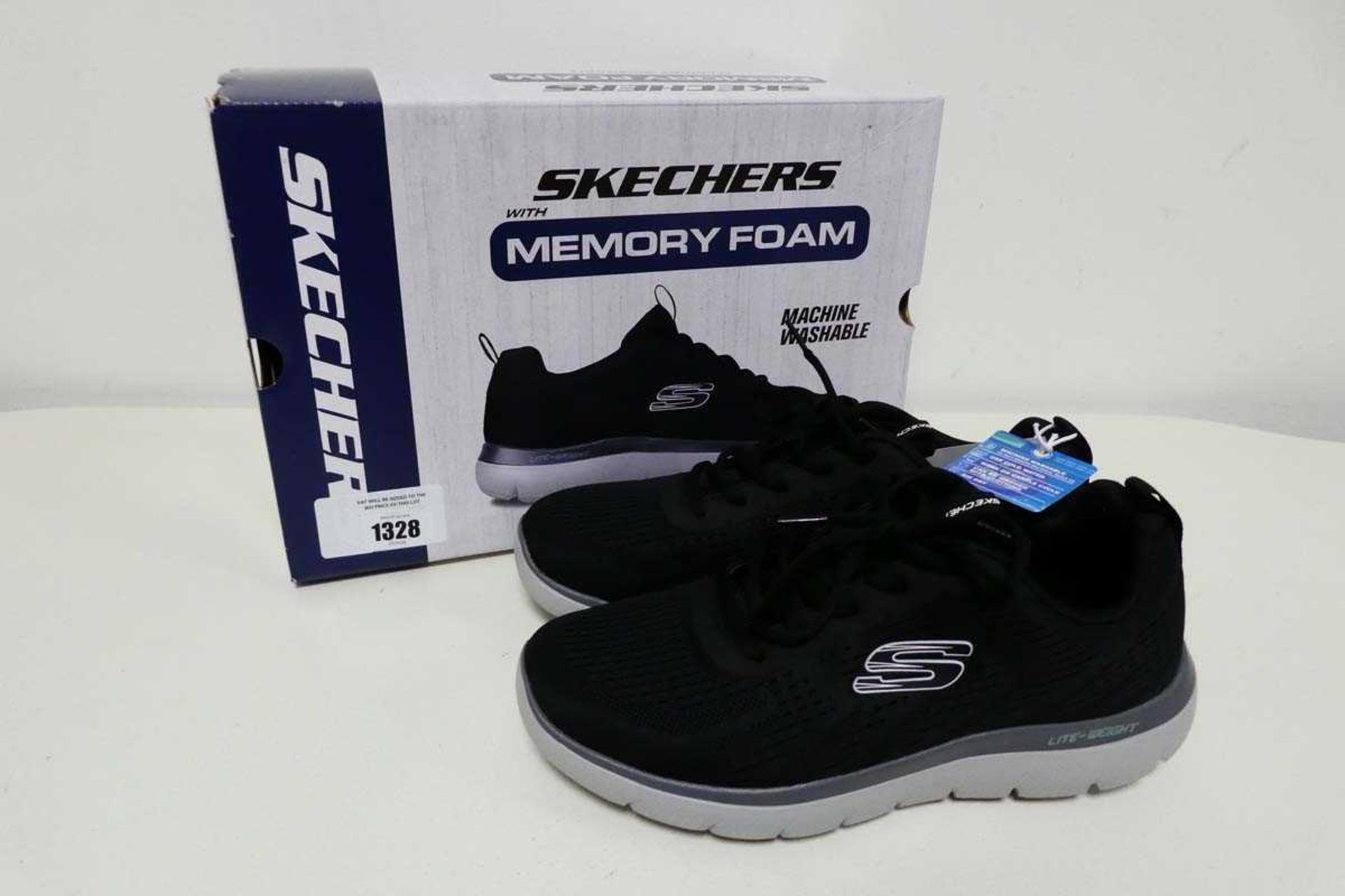 +VAT Boxed pair of mens Skechers memory foam trainers in black size 7