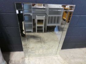 Unframed rectangular wall mirror