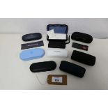 +VAT 8 designer glasses cases to include Gucci, Ray-Ban, Jaguar, Swarovski, Calvin Klein, Van