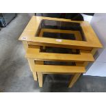 Rubber wood nest of 3 glass top coffee tables