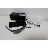 +VAT 1 pair of Nike windstorm sunglasses together with 1 pair of Nike reading glasses (both with