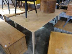 Modern wooden dining table on circular tapered supports