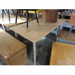 Modern wooden dining table on circular tapered supports