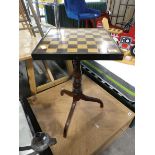 Single pedestal checker board table