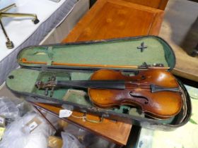 Violin in hard carry case in need of restoration