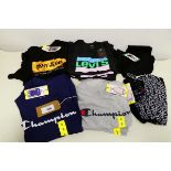 +VAT Approx. 20 items of branded clothing to include Levi's, DKNY, Champion & Reebok